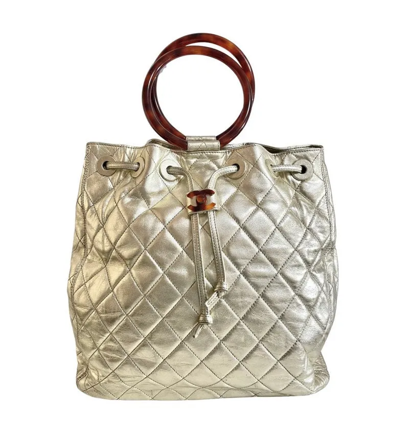 Chanel Vintage Campaign Gold Lamb Leather Hobo Bucket Bag With Marble Hoop Handles And Turn Lock Cc