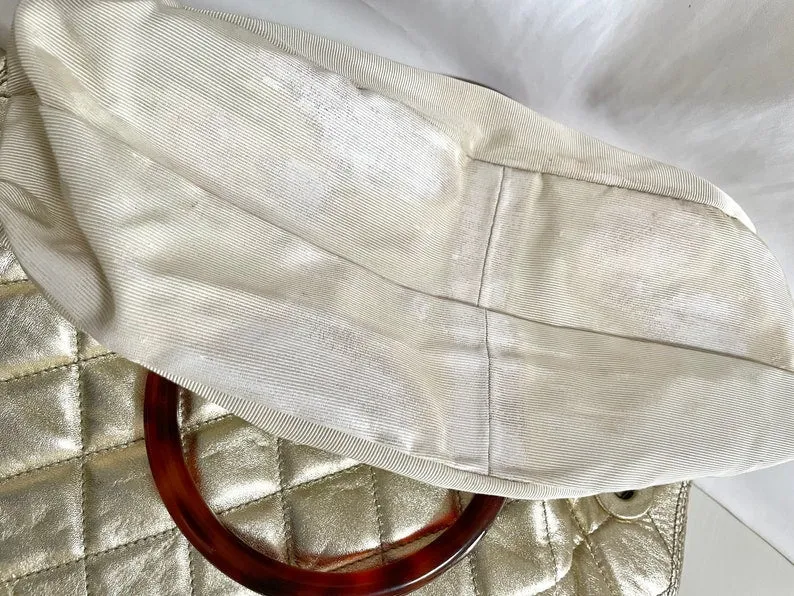 Chanel Vintage Campaign Gold Lamb Leather Hobo Bucket Bag With Marble Hoop Handles And Turn Lock Cc