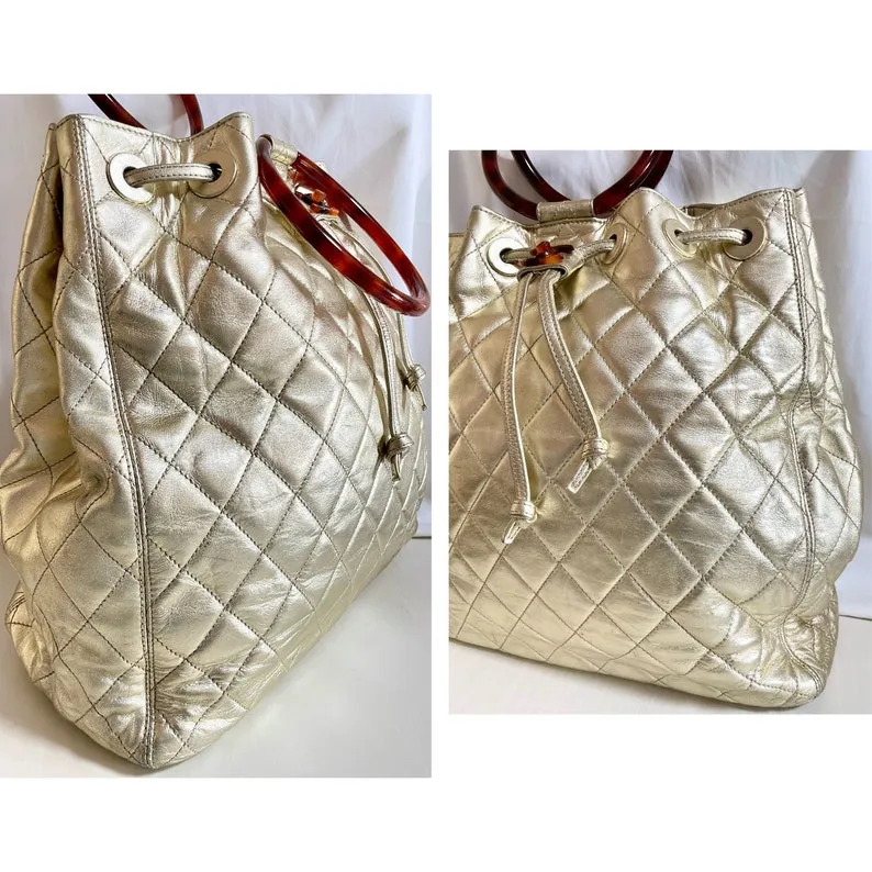 Chanel Vintage Campaign Gold Lamb Leather Hobo Bucket Bag With Marble Hoop Handles And Turn Lock Cc