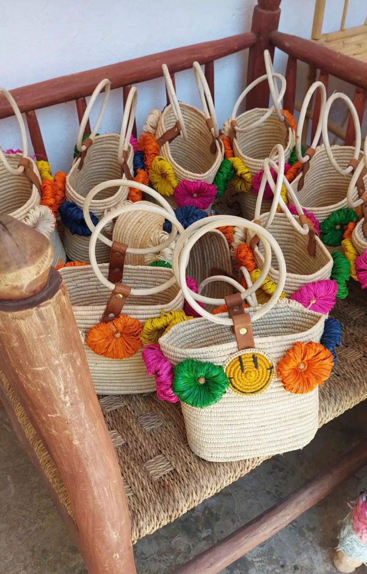 Smiley raffia bucket bag