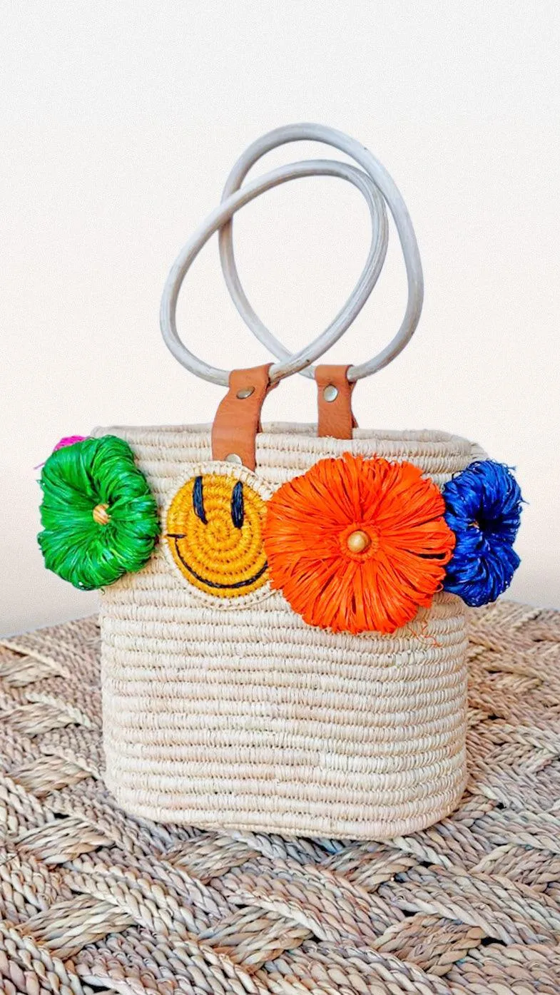 Smiley raffia bucket bag